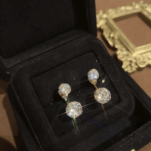 Semplici orecchini a sfera con diamanti vuoti